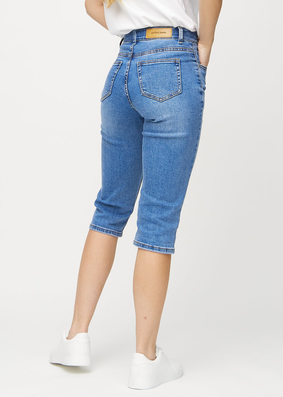 Denim regular capris seen from the back, so the entire product can be seen.