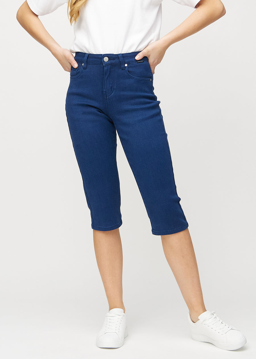 Dark blue regular capris, model name Royals, with a straight fit through the leg and ending just below the knee, seen from the front.