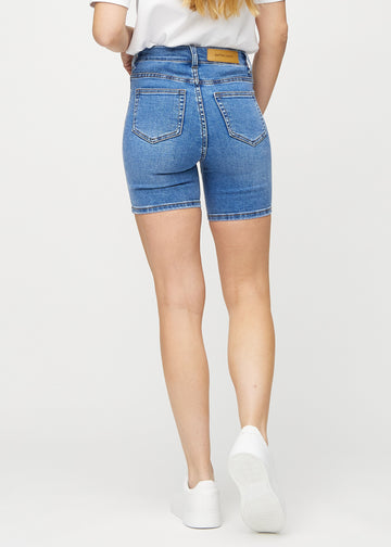 Denim skinny short shorts seen from the back, so the entire product can be seen.