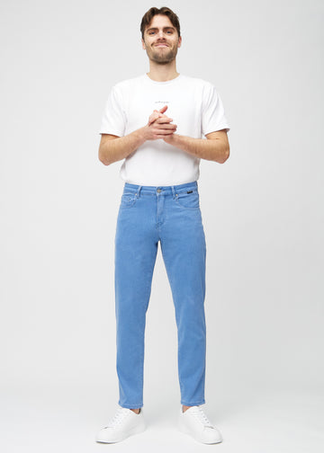 Full image of model in blue regular jeans.