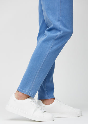 The ankles of a model, so you can see how loose the jeans fit.