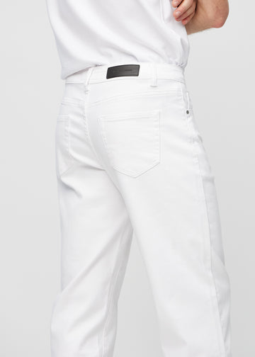 White regular jeans seen from the back close up to show details.
