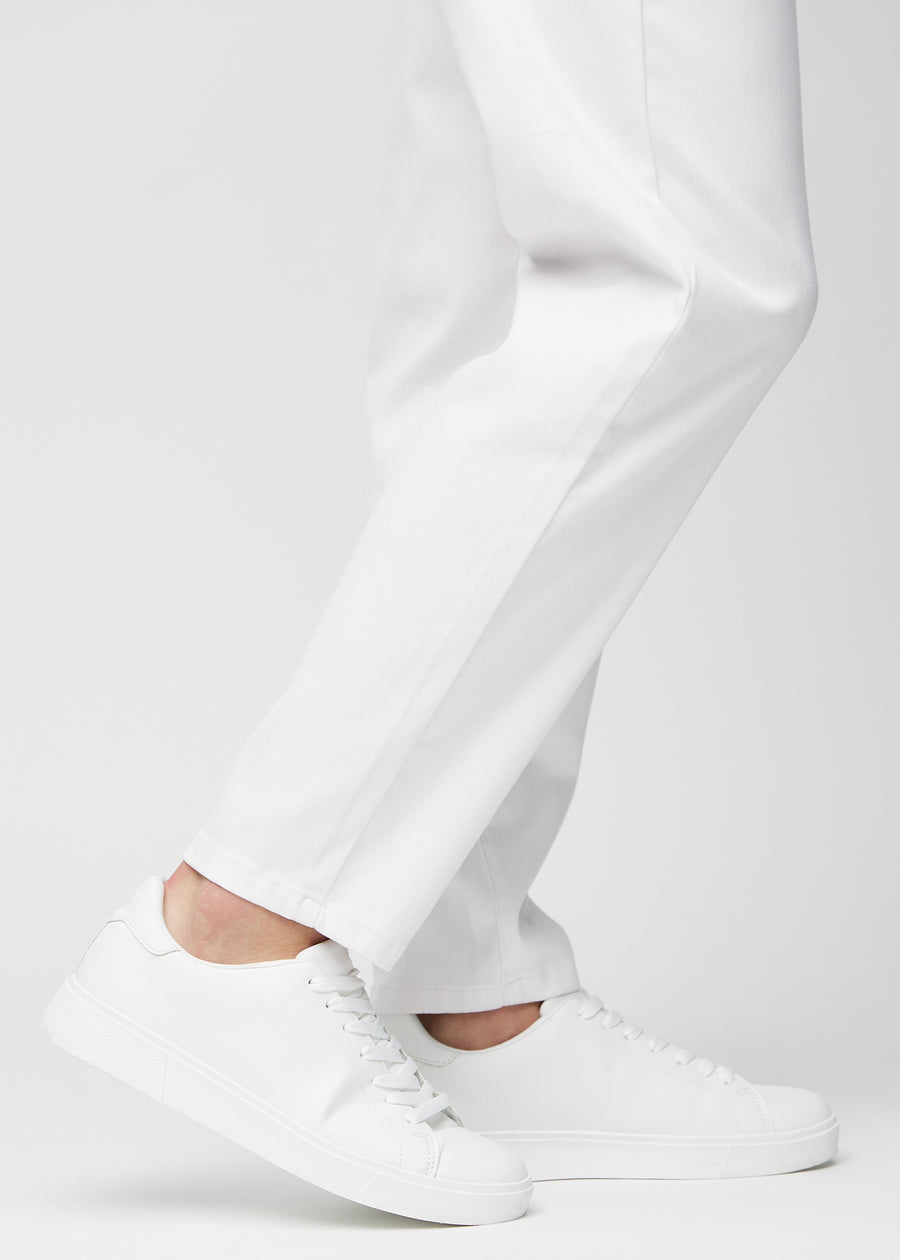 The ankles of a model, so you can see how loose the jeans fit.