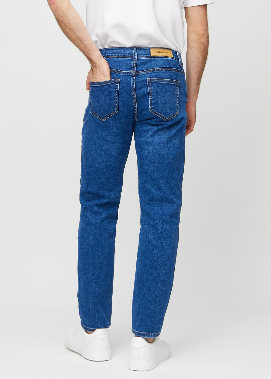 Dark blue denim regular jeans seen from the back, so the full product can be seen.